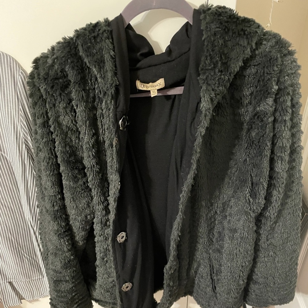 Black warm jacket. Faux fur.